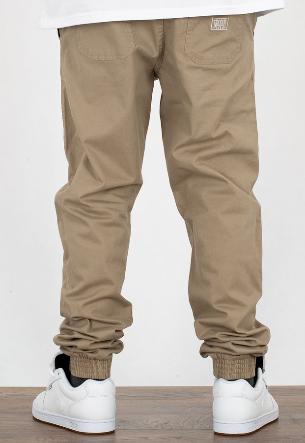 Spodnie B.O.R. Biuro Ochrony Rapu Jogger Fit Guma Strecz BOR New Outline beżowe
